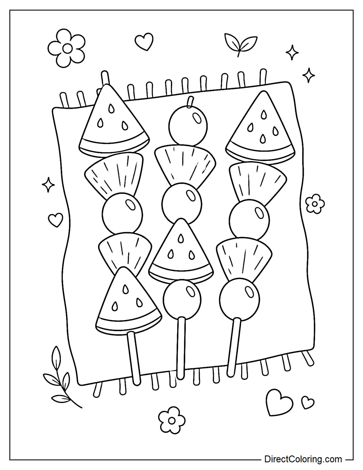 Fruit skewers are neatly arranged on a simple picnic blanket, each skewer containing large chunks of fruit such as watermelon, pineapple, and grapes.
