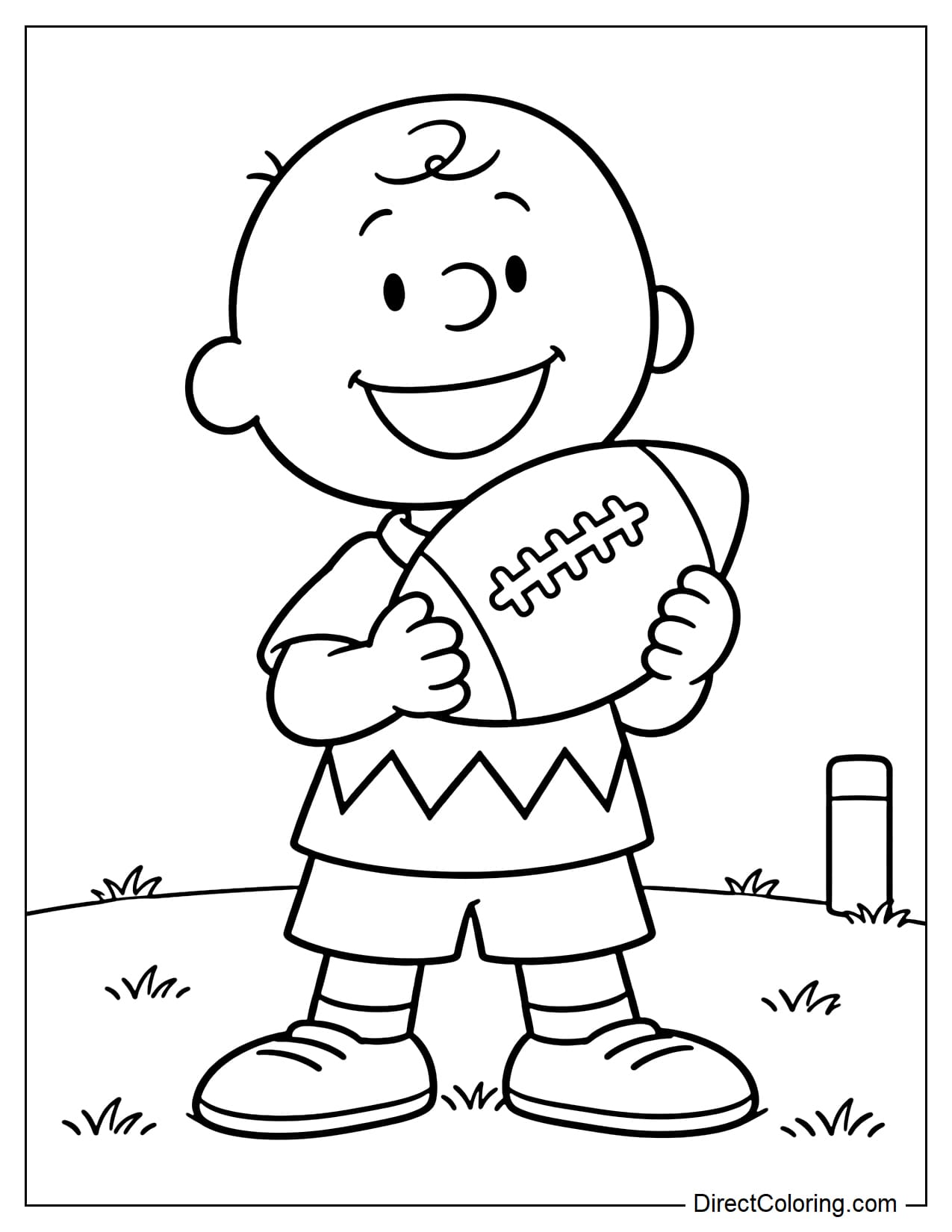 Charlie Brown stands smiling, holding a large football against his chest with both hands.