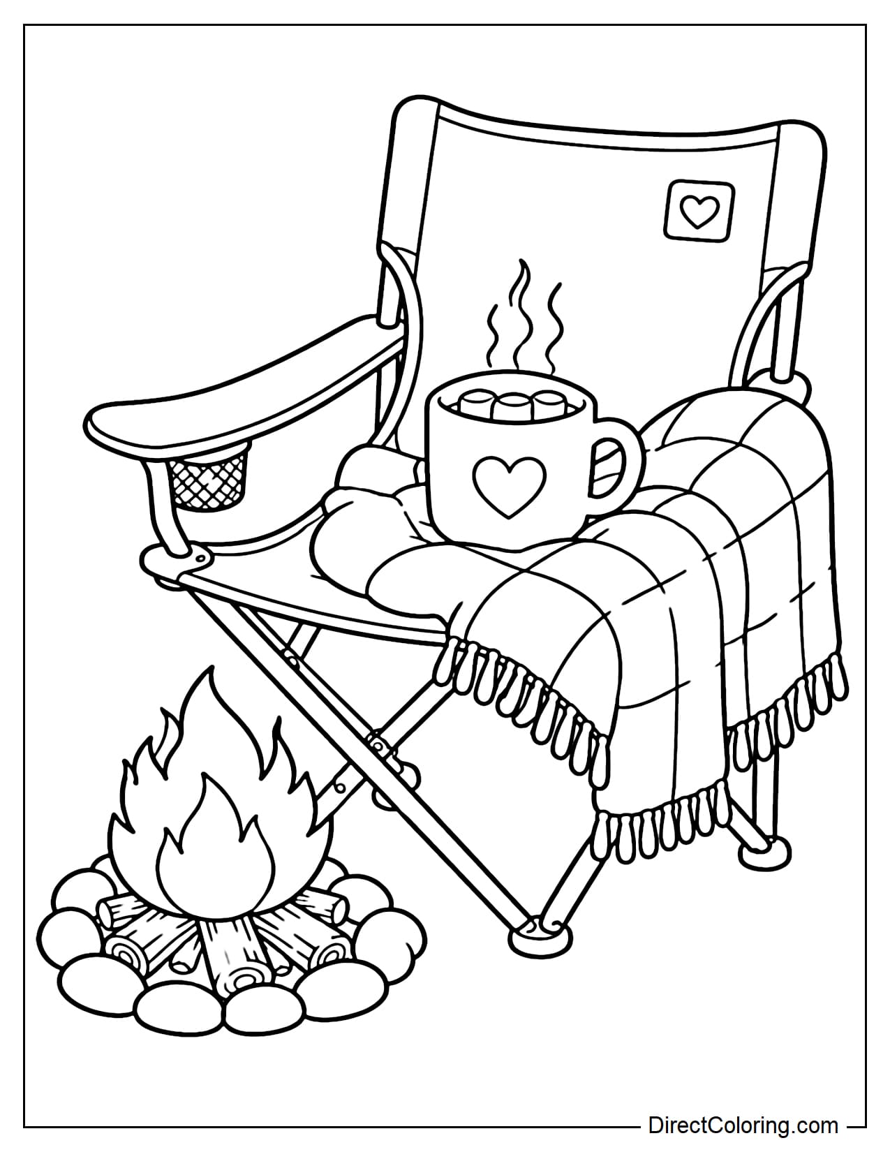 A folding camping chair placed next to a small campfire, with a large cup of hot cocoa and a soft blanket on the chair.