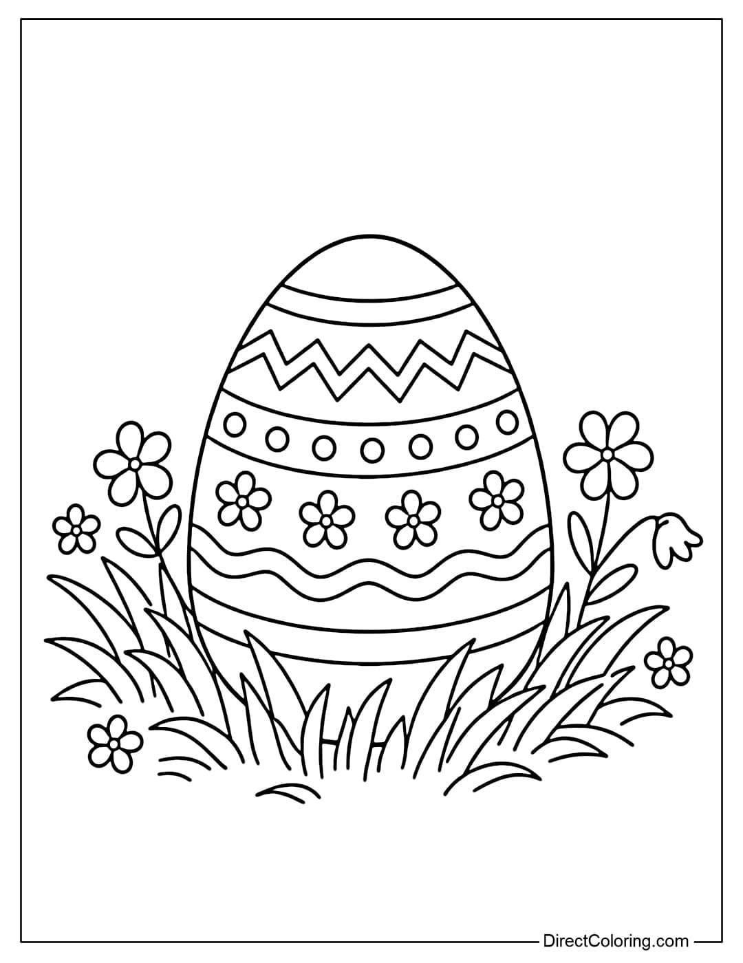A coloring page of an Easter egg nestled in the grass with a few small flowers around it.